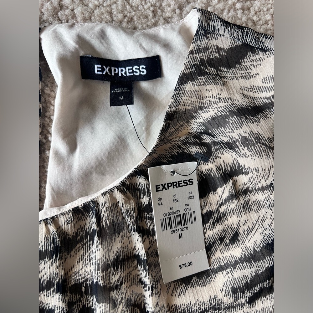 Express brand short, ruffled, animal print sleeveless dress. Size Medium. - Picture 3 of 4